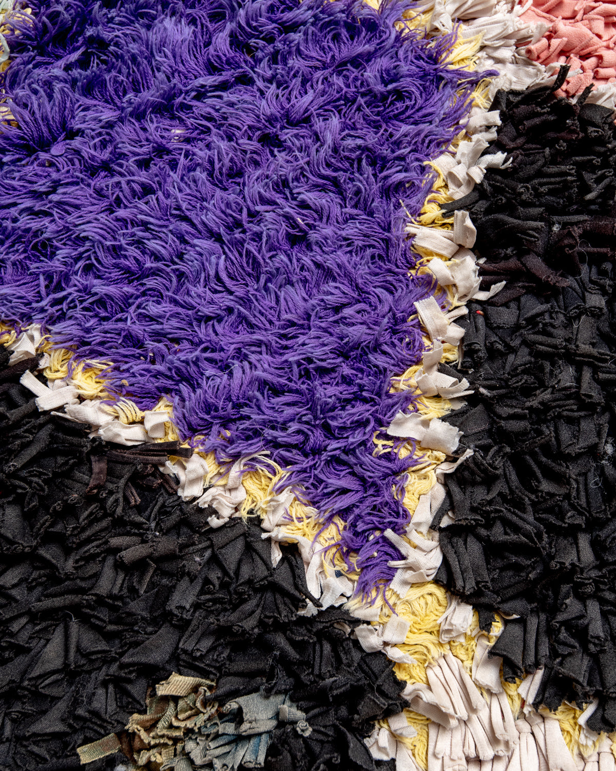 Modern designer vintage handcrafted Berber rug from Morocco. Boucherouite runner rug with beautiful colors and patterns.